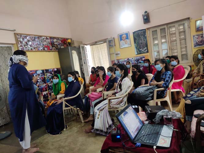 Dialogue with the young women at the sewing centers